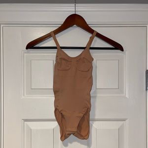SKIMS SCULPTING BODYSUIT WITH SNAPS in Ochre S/M